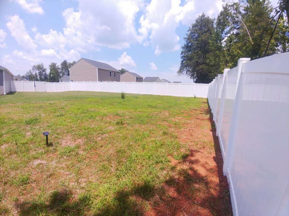 tall white fence